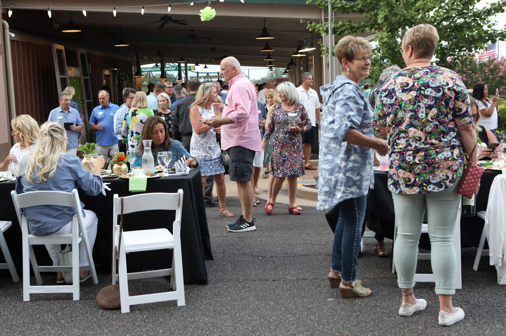 Guests find their dinner seats